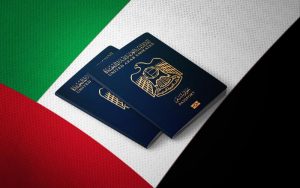 Passport of United Arab Emirates on the top of an flag of emirates