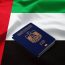 Passports of United Arab Emirates on the top of an flag of emirates
