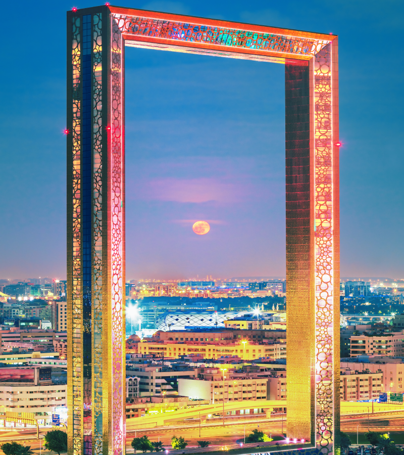 Dubai Frame glowing at night